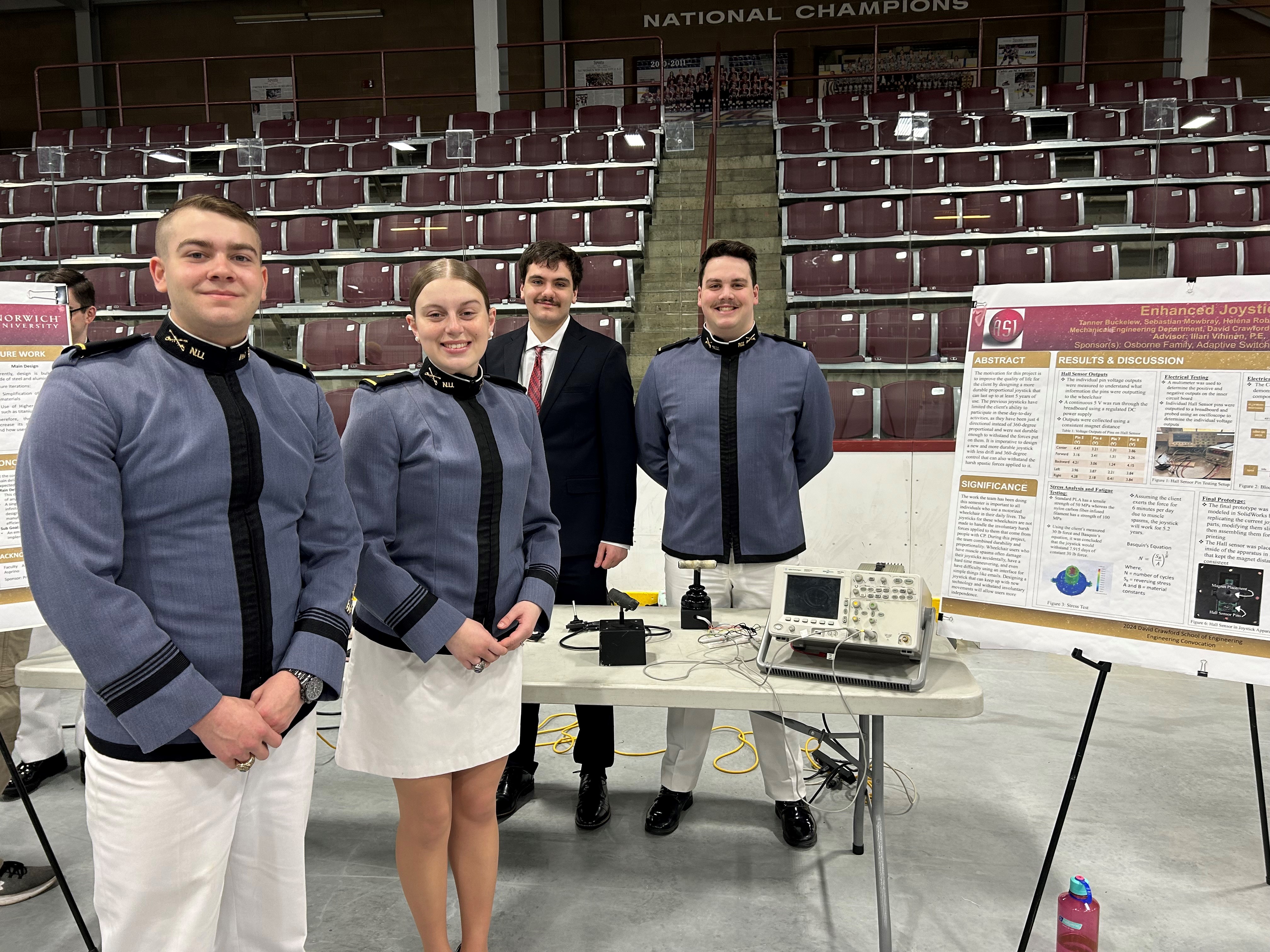 Four senior Norwich University engineering students combined their skills to build a prototype joystick for a client with cerebral palsy