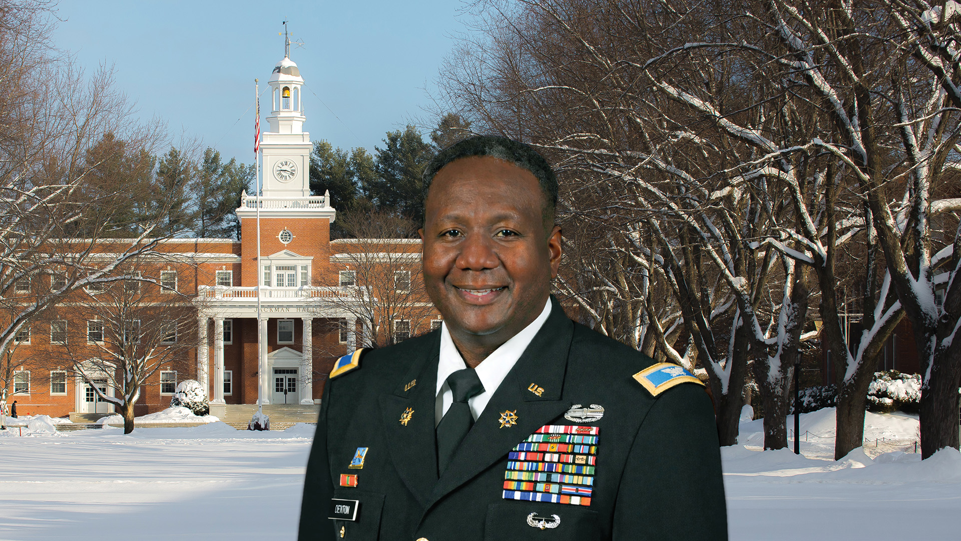 COL Mark Denton profile in front of winter Jackman hall image