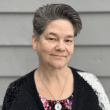 Woman with shawl and medallion