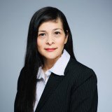 Woman in Business Suite with long dark hair