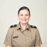 Cadet in uniform faces the camera against a plain background.