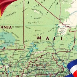 Map of Mali with Mali national flag in upper left corner and Russian national flag in bottom right corner