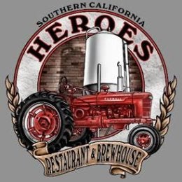 text: Southern California HEROES Restaurant & Brewhouse surrounds a red tractor and large grain tank.