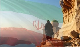 Iranian flag faded into a desert scene with a woman in a burka in the foreground facing away