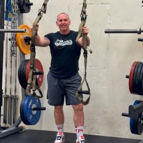 Image of Scott Caulfield in the weight room of Norwich Athletics