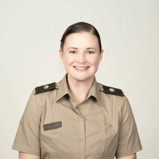 Cadet in uniform faces the camera against a plain background.