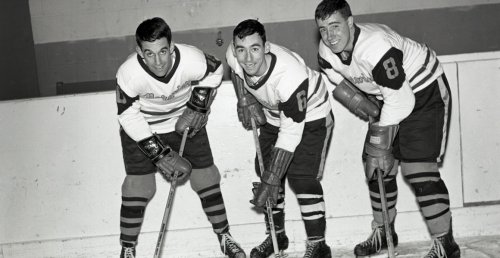 three NU hockey teammates from NU'65