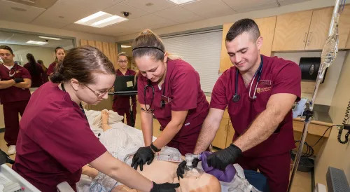 Norwich University Nursing Students working in simulation