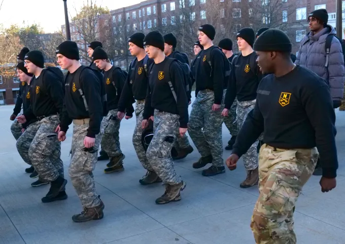 Student in LCW marching on campus in formation.