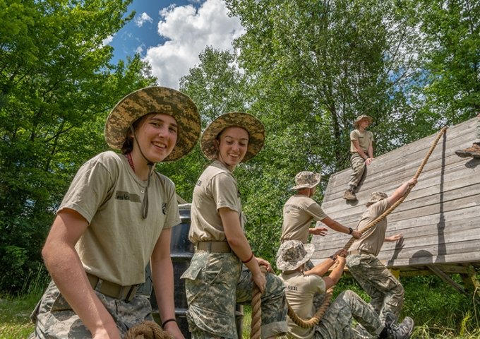FLC campers tackling the obstacle course.
