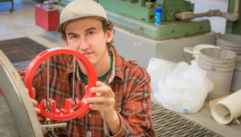 Civil Engineering major shows his senior research project at Norwich University.