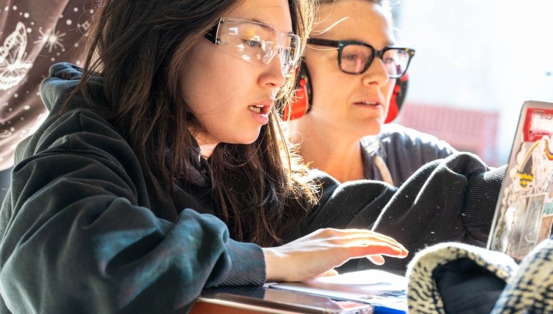 Architecture students working on project plans