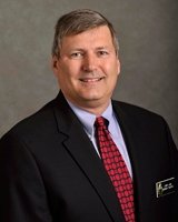 Mr. Larry A. Lang NU’77