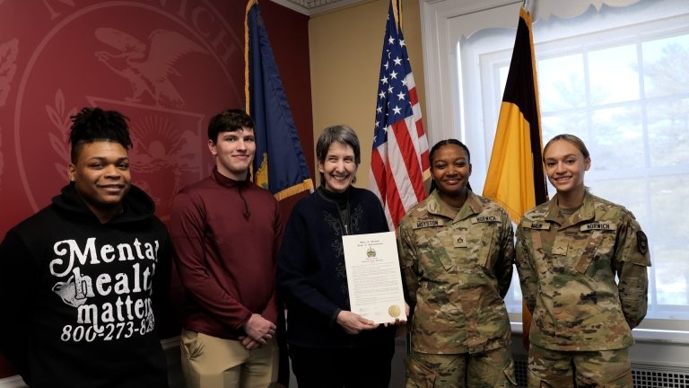 Representative Anne Donahue (Northfield), William Kolb, Imari Milton, Cadet Kimeisha Moyston, and Cadet Leslie Malin