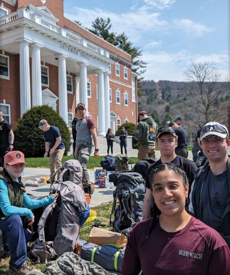 Expeditionists prepare to embark on their journey on the front steps of Jackman Hall