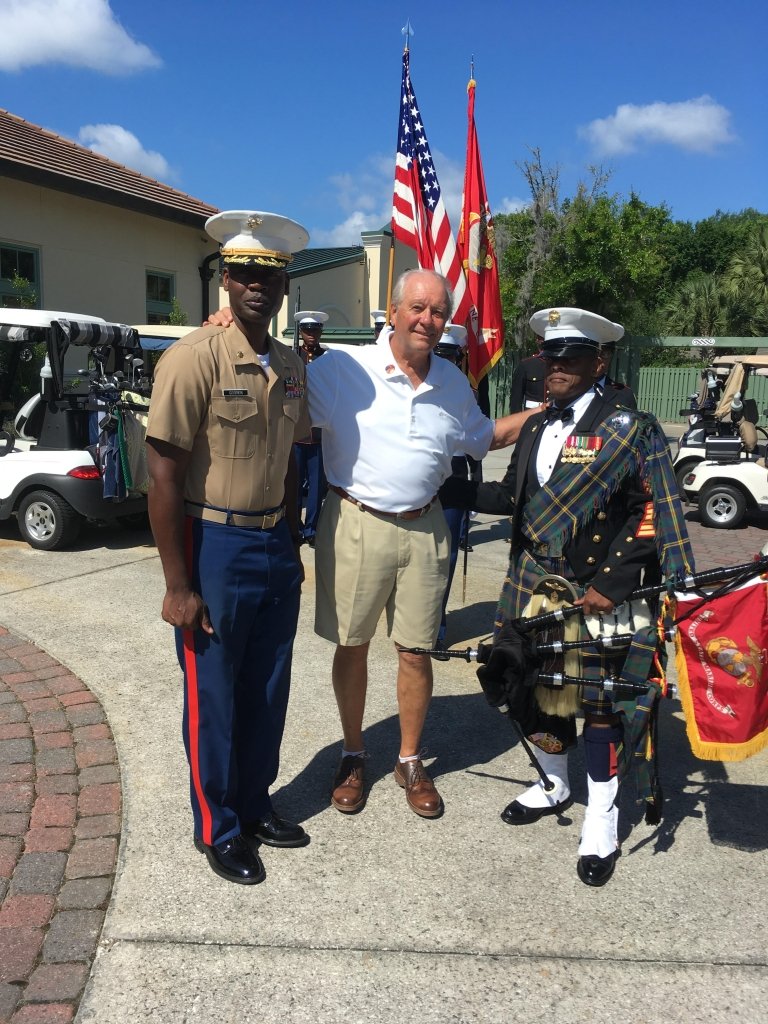 Sig Borkoski stands alongside two Marines who he recruited for the ceremony.