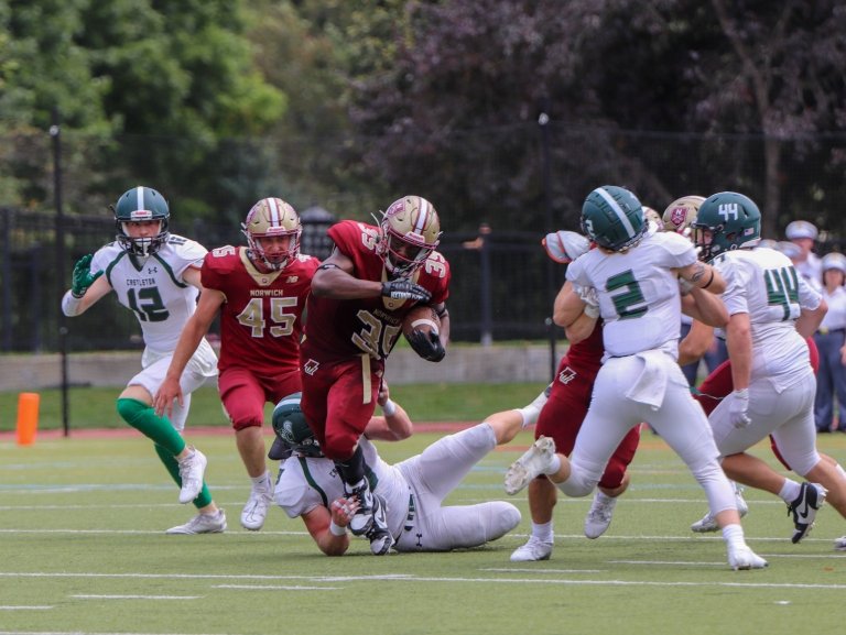 Jehric Hackney breaks a tackle running the football.