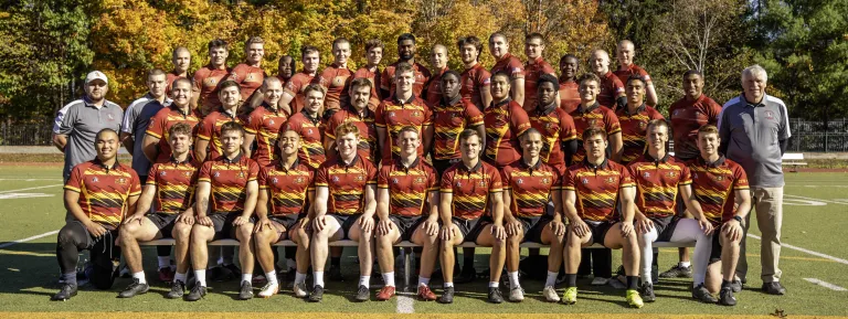 A team photo of the men's rugby team on Sabine Field.