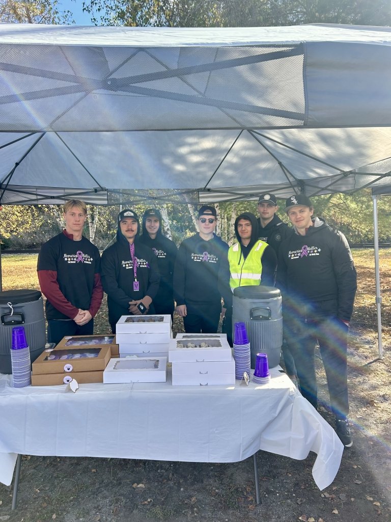 Volunteers hand out treats and drinks to support the “Memories Matter” 5K, raising awareness for Alzheimer’s.
