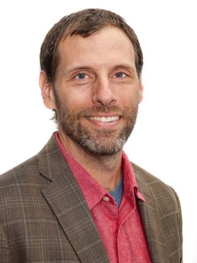 Portrait of Kenneth Cohen.