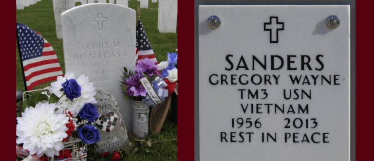 Gravestones for Louis M. Bonacasa and Gregory Wayne Sanders are shown with flowers and American flags.