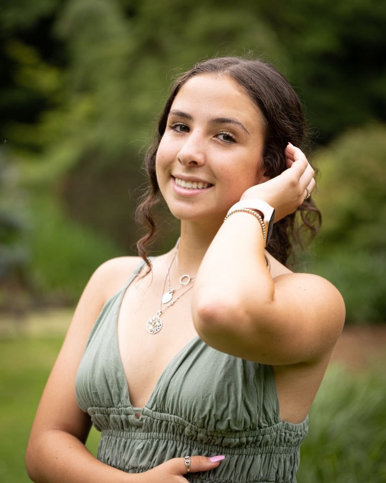 Young women in a green dress