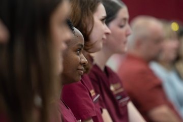 Images of the White Coat Ceremony during homecoming week. 