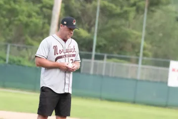 Norwich University Athletic Director Ed Hockenbury with The Vermont Mountaineers to throw the first pitch at Norwich Night
