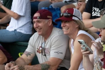 Family in the stands at Norwich Night at the Vermont Mountaineers.