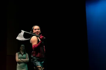 Pegasus Players - She Kills Monsters - Actor on stage with ax