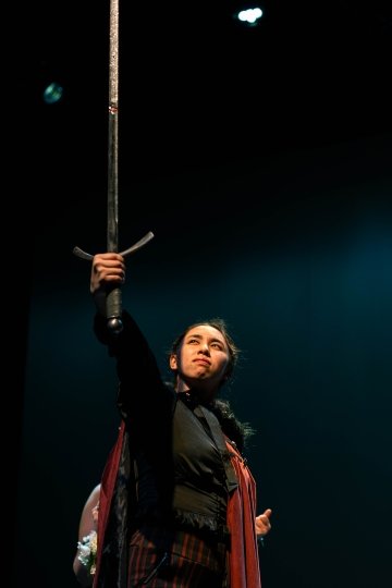 Pegasus Players - She Kills Monsters - Actor on stage with sword