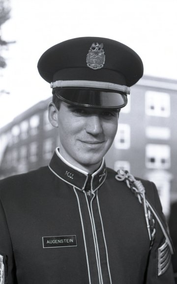 man in military uniform and cap, identifed as LTJG Richard Augenstein USN