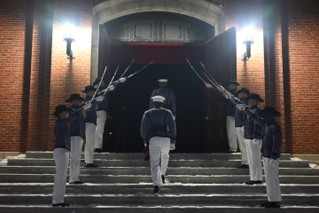 Cadets walk into Plumly Armory.