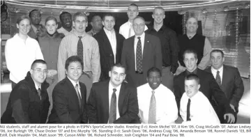 Norwich students include Eric L. Murphy '06 (kneeling, far right); Sarah C. Davis '06 (middle row left, white shirt) 