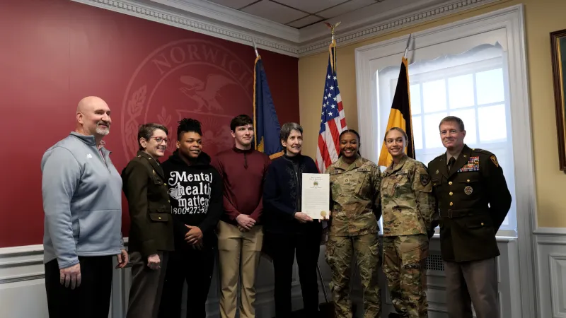 Representative Anne Donahue (Northfield), Provost & Dean of the Faculty, and Acting President Dr. Karen Gaines, 56th Commandant of Cadets and Vice President of Student Affairs Bill McCollough ’91, William Kolb, Imari Milton, Cadet Kimeisha Moyston, and Cadet Leslie Malin