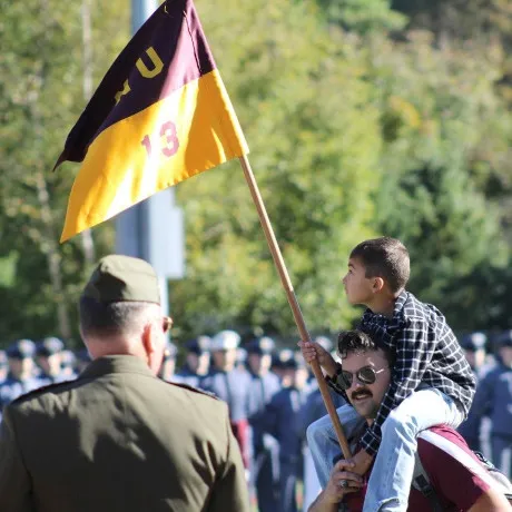HC25 - Alumni Parade - NU Class of ’13, father and child